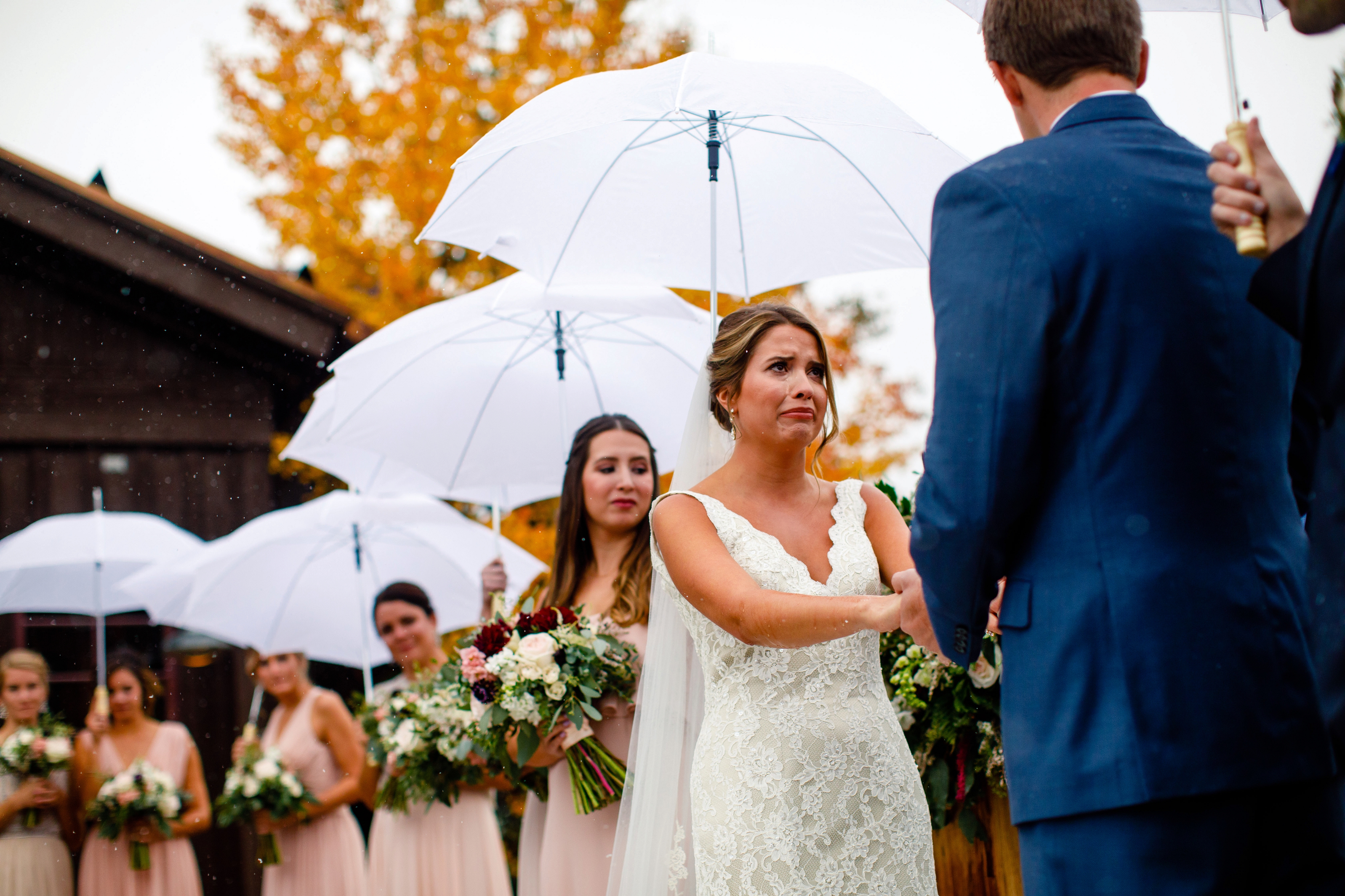 A bride cries during her ceremony at Tenmile Station in Breckenridge, CO. A bride cries during her ceremony at Tenmile Station in Breckenridge, CO.